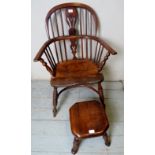 A 19th Windsor fireside armchair together with a small occasional stool,