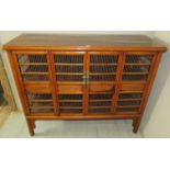 A 20th century Chinese show wood pantry/chicken cupboard with central doors all decorated with