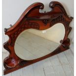 A late Victorian mahogany over mantel mirror in good condition,