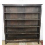 A 20th century freestanding open bookcase with 4 shelves, slightly a/f,