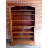 A large 20th Century mahogany open bookcase on stand with six adjustable shelves and of good rich