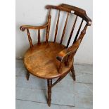 A late Victorian open sided spindle back office armchair, c1900,