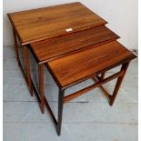 A nest of 3 graduated rosewood Danish Mobler side tables in good condition,