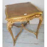 A very ornate 19th Century giltwood occasional table in the French taste (a.