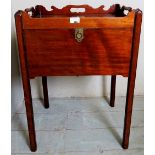 A Georgian design mahogany tray top bedside cupboard with a slide down front panel for storage,