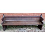 A c1900 oak pew in good solid condition, 7` long,