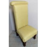 A Victorian prie dieu/prayer chair upholstered in a yellow material, good condition,