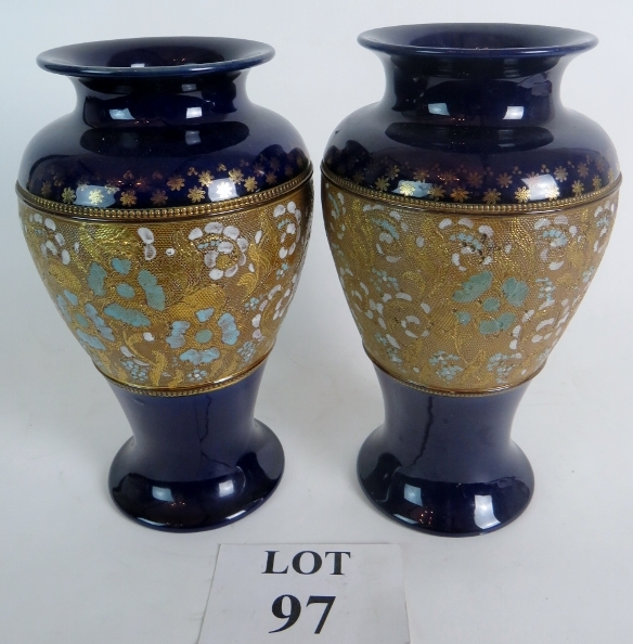 A pair of Royal Doulton vases with ename