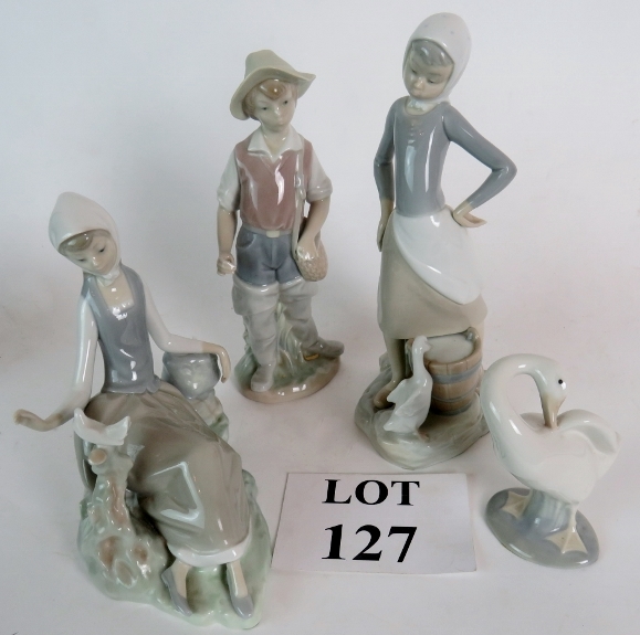 Four Lladro figures: girl with dove, gir