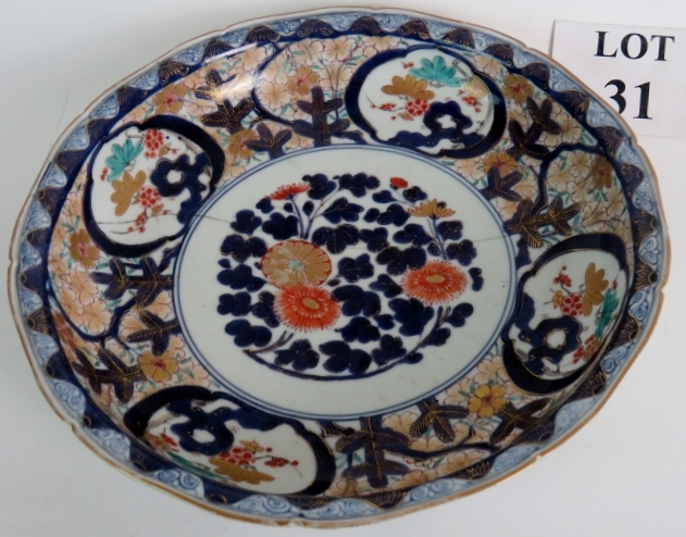 19th century Imari dish with old staple