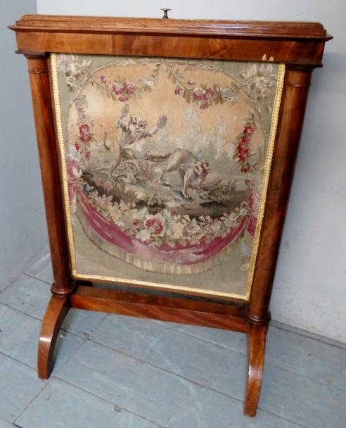 A Victorian walnut pull up fire screen w