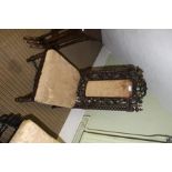 A VICTORIAN FANCY CARVED FRAMED SINGLE CHAIR with upholstered back and seat pad
