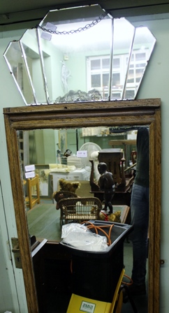 A LARGE WOODEN FRAMED RECTANGULAR AND ONE FAN SHAPED PLAIN PLATE MIRROR