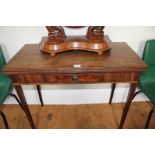 A 19TH CENTURY MAHOGANY FOLDOVER TEA TABLE on square tapering supports, 88cm wide