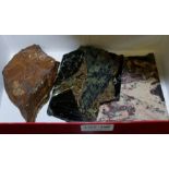 A SHOEBOX CONTAINING THREE PART POLISHED ROCK AND MINERAL SPECIMINS