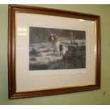 A SIGNED LIMITED EDITION PRINT of a working spaniel, in plain mount and wood effect frame