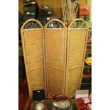 A WOVEN BAMBOO THREE PANEL FOLDING ROOM SCREEN