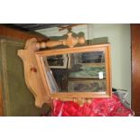 A MODERN PINE FRAMED ADJUSTABLE DRESSING TABLE MIRROR ON SHAPED PLINTH SUPPORT