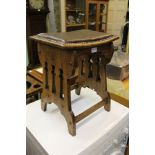 A FIRST QUARTER 20TH CENTURY ARTS AND CRAFTS DESIGNED STOOL having later had work top supported on