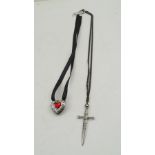AN "ALCHEMY" PEWTER NECKLACE, Swarovski set, of heart and dagger design, titled "Love is King" ,
