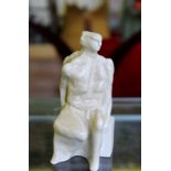 A PETER WRIGHT LIMITED EDITION PORCELAIN MALE "MORPHING" FIGURE typically sat on a plain block base