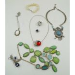 A QUANTITY OF COSTUME JEWELLERY, to include a mother-of-pearl bracelet