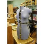 AN ADJUSTABLE TABLE TOP MANNEQUIN/DUMMY