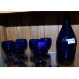 PROBABLE 19TH CENTURY BRISTOL BLUE GLASS DECANTER AND STOPPER together with six knobbly stemmed