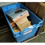 A SMALL BLUE CRATE CONTAINING A SELECTION OF CHILDREN'S ANNUALS and other printed matter