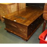 A MODERN BLOCK BUILT RECTANGULAR BOX COFFEE TABLE with three-quarter lift-up lid, opposing twelve