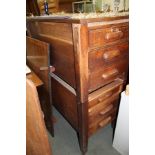 A CRAFTSMAN BUILT TALL BANK OF DRAWERS (formed from pedestals of a mid-century desk)