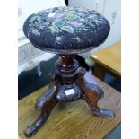CIRCULAR WOOL WORK PAD TOPPED PIANO STOOL On ornately carved 3 legged base