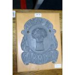 PRESSED TIN FIRE INSURANCE MARK bearing the name "Farmers" later mounted onto a wooden back board