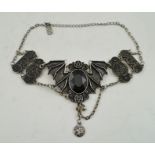 A "RESTYLE" CAST PEWTER BAT FORM CHOKER NECKLACE, stone set with Necromonicon symbols