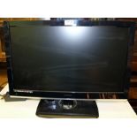 LED FLATSCREEN REMOTE CONTROL TELEVISION with Freeview, bearing the name E-Motion