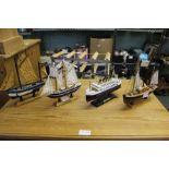 FOUR VARIOUS MODEL SHIPS TO INCLUDE THE TITANIC