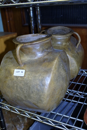 TWO BLADDER BOTTLES of globular form with shallow neck and twin handles