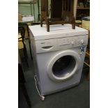 A WHITE FINISHED UNDER COUNTER BOSCH CLASSIXX 1000 EXPRESS WASHING MACHINE