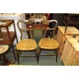 A PAIR OF LATE 19TH/EARLY 20TH CENTURY CONTINENTAL SINGLE CHAIRS with carved bar backs and woven
