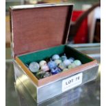 HALLMARKED SILVER ENGINE CHASED LIDDED BOX CONTAINING A COLLECTION OF VINTAGE MARBLES