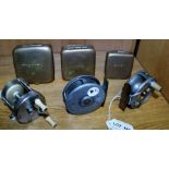 TWO LATE 19TH/ EARLY 20TH CENTURY METAL FISHING REELS retailed through the Army and Navy stores