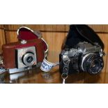 TWO RETRO CASED CAMERAS