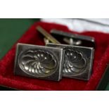 PAIR OF GEORG JENSEN SILVER CUFFLINKS decorated with stylised flower heads