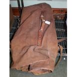 A VINTAGE CANVAS AND LEATHER SPORTING EQUIPMENT HOLDER