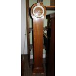 AN ART DECO DESIGN WALNUT CASED GRANDMOTHER CLOCK