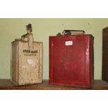 TWO VINTAGE PAINTED METAL FUEL CANS, one branded Esso Blue Parafin, the other SM & BP Ltd (with