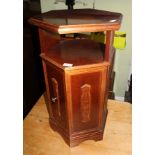 A MAHOGANY FINISHED HEXAGONAL SHAPED OCCASSIONAL TABLE with plain top, having storage recess over