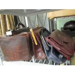 A VINTAGE LEATHER GLADSTONE BAG, together with THREE LADY'S HANDBAGS