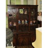 A WELL MADE SMALL PROPORTIONED MAHOGANY BOOKCASE with three bar glazed upper doors on a deeper