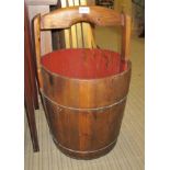 AN ORIENTAL SOFTWOOD FIXED HANDLE BUCKET